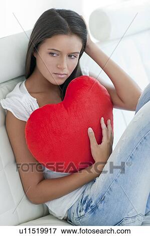 Lovesick teenage girl View Large Photo Image Stock Photo - Lovesick teenage girl. Fotosearch