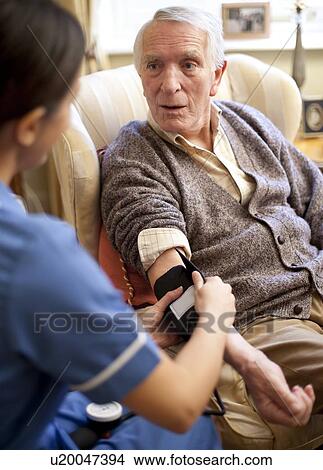 Picture - Measuring blood pressure. Fotosearch