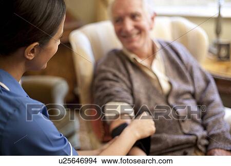 Picture - Measuring blood pressure. Fotosearch