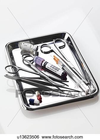 Stock Photograph - Medical equipment on a tray. Fotosearch