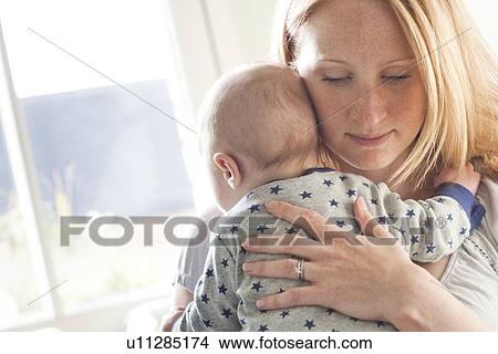 Mother and baby View Large Photo Image Picture - Mother and baby. Fotosearch