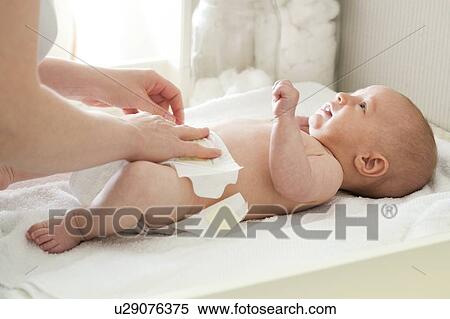 Nappy changing View Large Photo Image Stock Photography - Nappy changing. Fotosearch