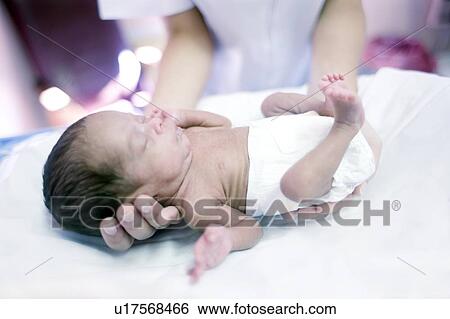 Nurse and premature baby View Large Photo Image Stock Photograph - Nurse and premature baby. Fotosearch