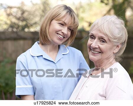 Nurse on a home visit View Large Photo Image Picture - Nurse on a home visit. Fotosearch