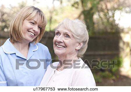 Nurse on a home visit View Large Photo Image Stock Image - Nurse on a home visit. Fotosearch