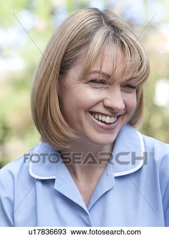 Nurse smiling View Large Photo Image Stock Image - Nurse smiling. Fotosearch