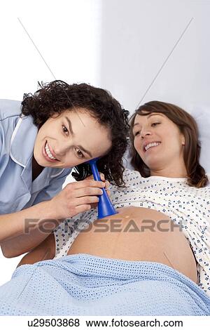 Stock Photo - Obstetric examination. Fotosearch