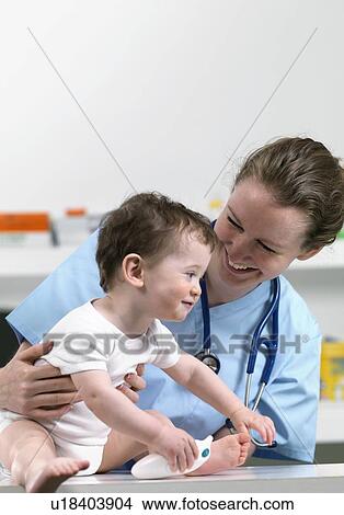 Paediatric examination View Large Photo Image Picture - Paediatric examination. Fotosearch