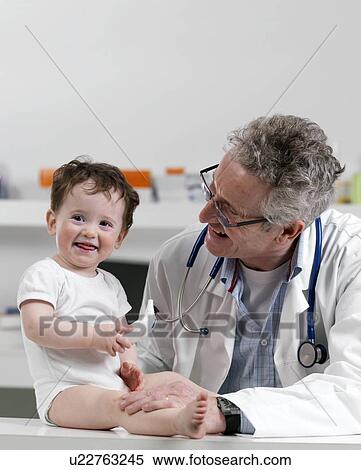 Stock Photography - Paediatric examination. Fotosearch