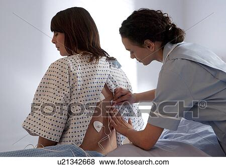 Stock Photo - Pain relief during labour. Fotosearch