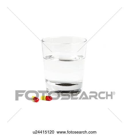 Stock Image - Pills and a glass of water. Fotosearch