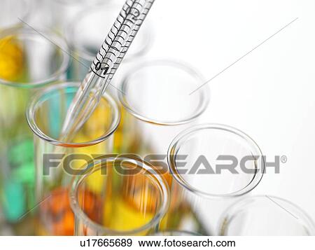 Stock Photo - Pipetting. Fotosearch