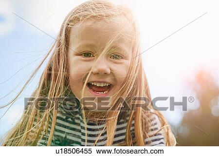 Portrait of girl looking at camera smiling View Large Photo Image Stock Photography - Portrait of girl looking at camera smiling. Fotosearch