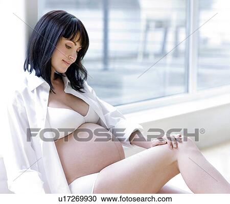 Stock Image - Pregnant woman. Fotosearch