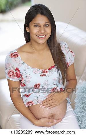 Stock Photo - Pregnant woman. Fotosearch