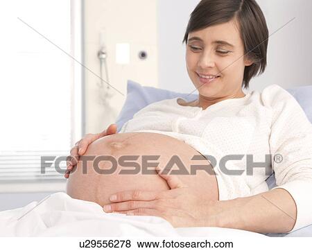 Pregnant woman View Large Photo Image Stock Photo - Pregnant woman. Fotosearch