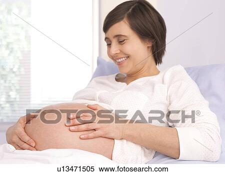 Stock Photography - Pregnant woman. Fotosearch