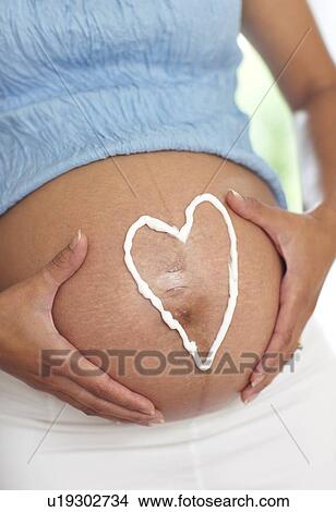 Pregnant woman's abdomen View Large Photo Image Picture - Pregnant woman's abdomen. Fotosearch