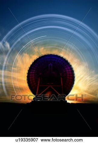 Stock Photo - Radio telescope and star trails, artwork. Fotosearch