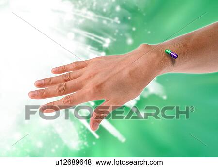 RFID chip capsule, conceptual artwork View Large Photo Image Stock Photo - RFID chip capsule, conceptual artwork. Fotosearch