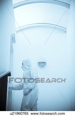 Scientist in an isolation suit View Large Photo Image Stock Photography - Scientist in an isolation suit. Fotosearch