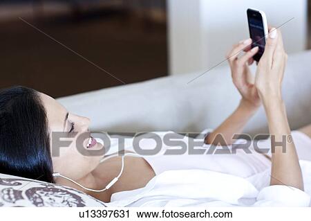 Stock Image - Smart phone use. Fotosearch