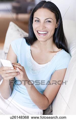 Stock Photo - Smart phone use. Fotosearch