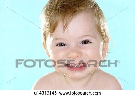 Stock Photography - Smiling baby boy. Fotosearch