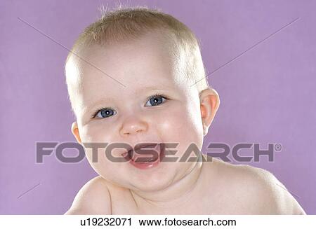Stock Image - Smiling baby girl. Fotosearch
