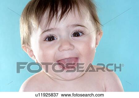 Smiling baby girl View Large Photo Image Stock Photo - Smiling baby girl. Fotosearch