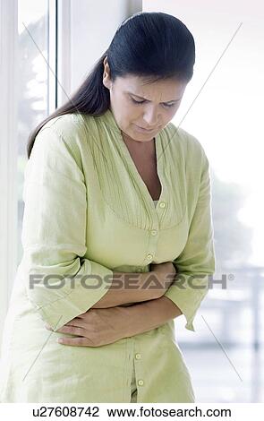 Stock Image - Stomach pain. Fotosearch
