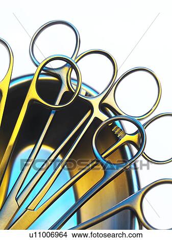 Picture - Surgical instruments in a dish. Fotosearch
