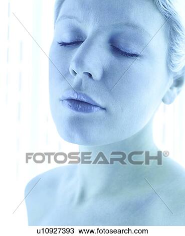 Stock Image - Tanning booth. Fotosearch