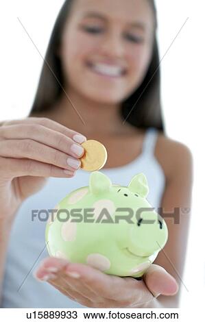 Teenage girl saving money View Large Photo Image Stock Image - Teenage girl saving money. Fotosearch