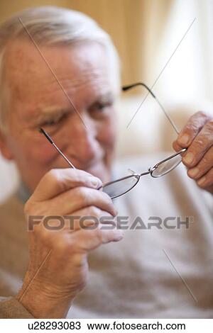 Wearing spectacles View Large Photo Image Stock Image - Wearing spectacles. Fotosearch