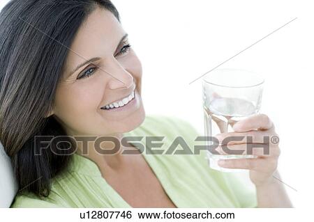 Stock Photograph - Woman drinking water. Fotosearch