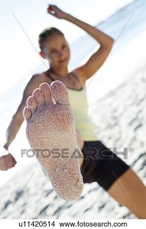 Woman exercising View Large Photo Image Picture - Woman exercising. Fotosearch