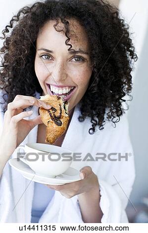 Woman having breakfast View Large Photo Image Stock Photography - Woman having breakfast. Fotosearch