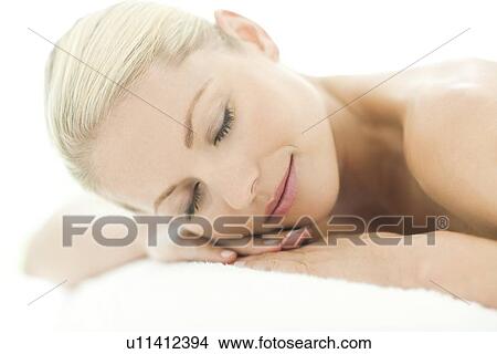 Woman relaxing at a spa View Large Photo Image Picture - Woman relaxing at a spa. Fotosearch