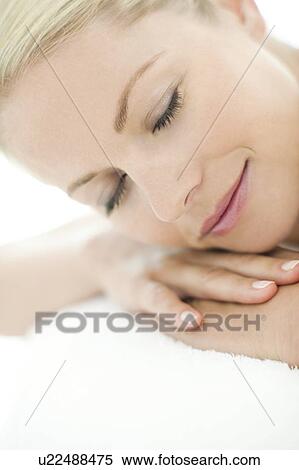 Woman relaxing at a spa View Large Photo Image Stock Photography - Woman relaxing at a spa. Fotosearch