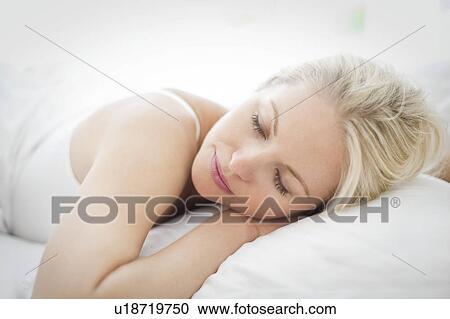Stock Image - Woman sleeping. Fotosearch
