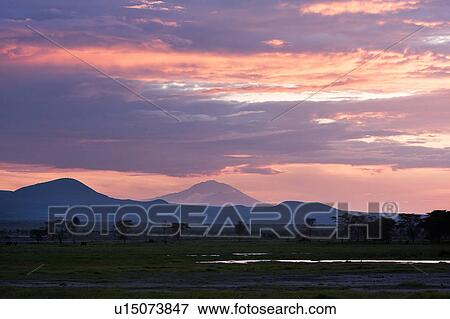 Stock Photo - blue, African, beauty, Kenya, Amboseli, clouds, Africa. Fotosearch