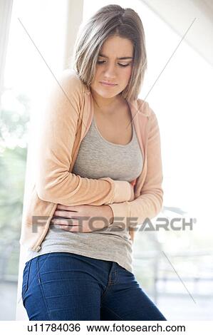 Abdominal pain View Large Photo Image Stock Photograph - Abdominal pain. Fotosearch
