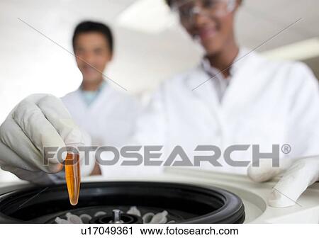 Stock Image - Centrifuging. Fotosearch