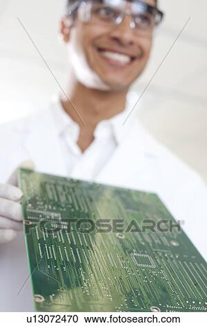 Stock Image - Circuit board manufacture. Fotosearch