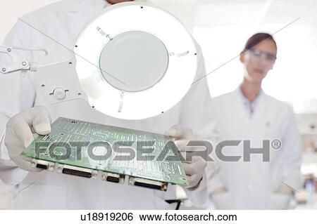 Circuit board manufacture View Large Photo Image Stock Photograph - Circuit board manufacture. Fotosearch