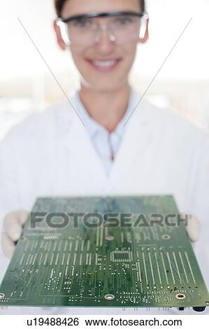 Circuit board manufacture View Large Photo Image Stock Photograph - Circuit board manufacture. Fotosearch