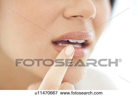 Stock Photo - Cold sore, conceptual image. Fotosearch