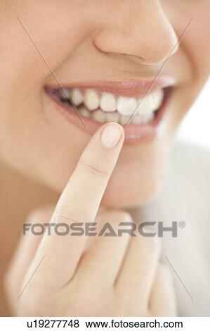 Stock Photo - Cold sore, conceptual image. Fotosearch