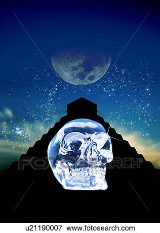 Stock Photo - Crystal skull and Maya pyramid, artwork. Fotosearch